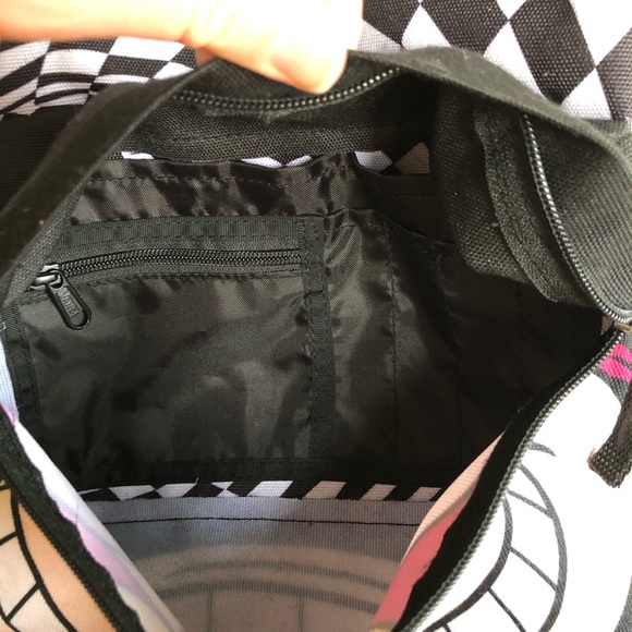 vans cheshire cat backpack
